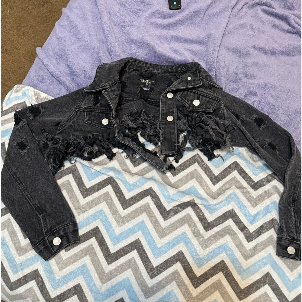 Distressed cropped black denim jacket. no stains. has all of its buttons.